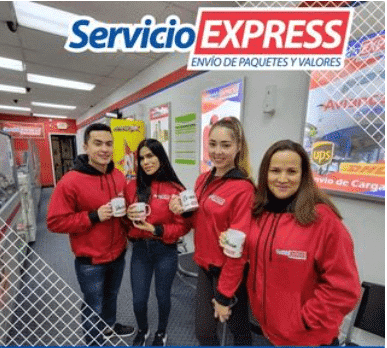The Servicio Express team in red uniforms inside their Hackensack store